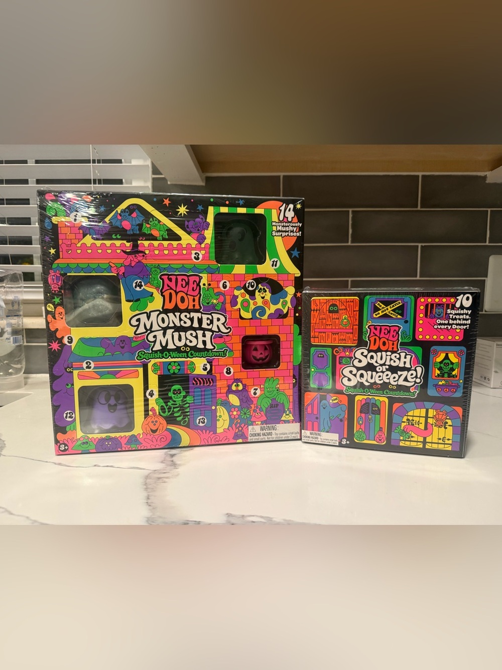 Two Target advent calendars. Monster Mush and Squish or squeeeze